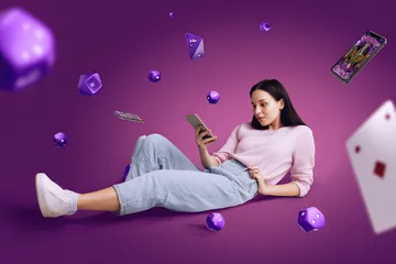 A woman smiling by bright slot machines showing lucky symbols, showcasing the exciting slot offerings at 4777BET.
